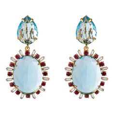 The Monica Earrings, crafted from semi-precious stones, showcase a unique shape and offer a removable drop, allowing for a versatile stud style. Their vintage and Art Deco influence add an element of timeless sophistication to their design.  Stones: Blue Quartz & Red Corundum  Material: 14K Gold Plated  Dimensions: 2 1/4" X 1" Interchangeable Earrings, Stud Style, Cute Nike Shoes, Pin Pendant, Blue Quartz, Semi Precious Stones, Accessories Rings, Silver Pearls, Semiprecious Stones