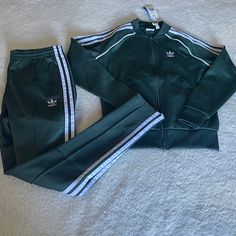 Brand New Adidas Set In Xs! Make An Offer Green Athleisure Outerwear With Ribbed Cuffs, Green Sportswear Track Jacket For Fall, Green Track Jacket For Fall Sportswear, Green Fall Track Jacket Sportswear Style, Green Track Jacket For Fall, Adidas Green Track Jacket For Spring, Casual Track Jacket With Side Stripes For Spring, Casual Spring Track Jacket With Side Stripes, Spring Casual Track Jacket With Side Stripes