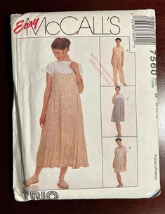 a woman's dress and top sewing pattern on a table