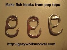 three fish hooks from can tabs hanging on a wall with the words diy