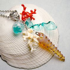 Hey, I found this really awesome Etsy listing at https://www.etsy.com/listing/237450447/red-ivory-coral-lampwork-pendant-sea Ocean-inspired Colorful Beads Necklace For Gift, Ocean-inspired Colorful Beads Necklace Gift, Ocean-inspired Colorful Bead Necklaces For Gifts, Gift Ocean-inspired Colorful Beads Necklace, Ocean-inspired Colorful Beads For Jewelry Making, Handmade Ocean Color Necklaces For Jewelry Making, Colorful Beaded Recycled Glass Jewelry As Gift, Colorful Recycled Glass Bead Jewelry As Gift, Recycled Glass Colorful Beaded Jewelry As Gift