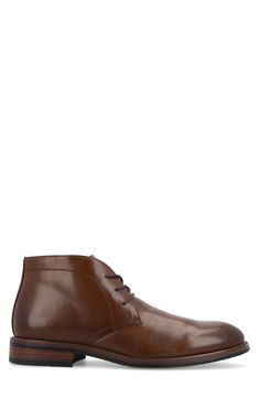 Elevate your work-to-weekend look in this refined faux-leather chukka boot featuring tonal stitch construction, breathable lining and a Tru Comfort Foam insole. Synthetic upper/textile lining/rubber sole Imported Brown Ankle Chukka Boots For Work, Fall Workwear Chukka Boots With Leather Lining, Brown Leather-lined Chukka Boots For Work, Brown Leather Lined Chukka Boots For Work, Brown Chukka Boots With Leather Lining For Work, Plain Toe Chukka Boots With Leather Footbed For Work, Workwear Chukka Boots With Leather Footbed, Leather Chukka Boots For Work, Workwear Moc Toe Chukka Boots With Leather Lining