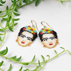 Elegant Frida Kahlo-inspired earrings with colorful Miyuki Beads, crafted by the Wounaan of Colombia and finished with gold plated ear-wires. Channel your inner Frida with these exquisite earrings. Drop length = 2.5in Multicolor Round Beads Earrings With Gold Beads, Multicolor Beaded Earrings With Gold Beads As Gift, Multicolor Festive Jewelry With Ear Wire, Festive Multicolor Jewelry With Ear Wire, Beaded Earrings For Festivals Gift, Beaded Earrings For Festivals And Gifts, Multicolor Drop Earrings With Gold Beads, Traditional Gold Beaded Earrings As Gift, Multicolor Gold Beads Dangle Earrings