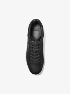 Designed with a minimalist aesthetic, the Keating low-top sneakers are a refined option for workdays or weekends. Made from supple leather, this sleek style works equally well with a suit or cuffed denim. Low-top Work Sneakers With Rubber Sole, Classic Low-top Business Sneakers, Lace-up Sneakers With Leather Sole For Work, Modern Low-top Business Sneakers, Modern Low-top Formal Sneakers, Modern Business Low-top Sneakers, Classic Low-top Formal Sneakers, Elegant Leather Sneakers For Work, Black Plain Toe Sneakers For Work