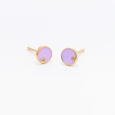 The Moon earrings are perfect go to pair of studs for all ages. The circular shape symbolizes infinite love and everlasting friendship. The name Celine means heavenly in Latin and Moon in Greek. Inspired by our Celine the Explorer. Stud Dimensions: 6mm | 1.5in thickness 925 Sterling Silver with 14k Gold finish Nickel free Lilac Enamel White Topaz Stone Handmade in India Minimalist Round Earrings With Bezel Setting, Minimalist Bezel Set Earrings, Minimalist Round Bezel Set Earrings, Minimalist Round Birthstone Earrings, Infinite Love, Topaz Stone, Moon Earrings, White Topaz, Gold Finish