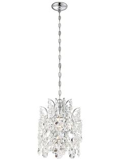 a chrome finish chandelier with clear crystal drops hanging from the ceiling, on an isolated white background