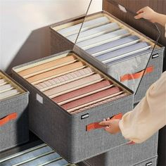 the drawers are organized with different types of fabric