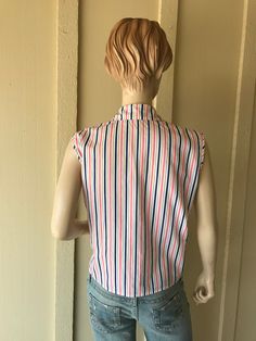 1960s Vintage Blouse ~ Charm Of Hollywood, Made In California ~ Striped Pink, Navy, & White Blue, Cotton, Sleeveless, Fitted, Blouse ~ Great Condition I will be mailing this Priority Mail or First Class International. Measurements Bust 42 Inch Waist 42 Inch Length 22 Inch Retro Summer Blouse, Retro Summer Blouse For Vintage Fashion, Retro Blouse For Summer Vintage Fashion, Summer Vintage Style Collared Tops, Retro V-neck Top For Workwear, Retro Summer Blouse For Work, Retro Summer Blouse For Workwear, Summer Retro Blouse For Workwear, Retro Pink Top For Work