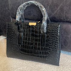 Black Handbag/Tote Bag With A Good Amount Of Space For Traveling Or Everyday Use! Just Purchased. In Brand New Condition! Trendy Box Bag With Handle Drop For Errands, Tote Satchel With Adjustable Handle For Errands, Black Satchel With Handle Drop, Black Satchel Shoulder Bag With Handle Drop, Black Tote Box Bag For Errands, Office Shoulder Bag With Handle Drop In Black, Elegant Satchel With Adjustable Handle For Errands, Office Box Bag Tote With Adjustable Handle, Office Tote Box Bag With Adjustable Handle