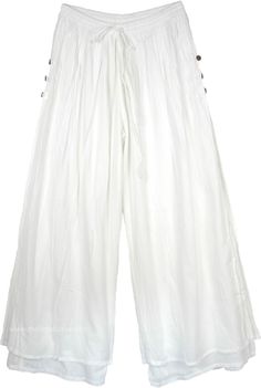 A relaxed pair of solid white colored palazzo pants for the summer season.  These pants are double layered in the same fabric and color. #tlb #SplitSkirtsPants #XLPlus #Misses #beachwrap #Solid #whiteleglinenpants #whitecottontrousers #whitesummerpantsincotton Solid Summer Pants With Buttons, Summer Solid Pants With Buttons, White Bohemian Harem Pants For Summer, Cotton Bottoms With Buttons For Vacation, White Cotton Wide Leg Culottes, White Harem Pants For Beach In Summer, White Harem Pants For Spring Vacation, Chic White Harem Pants For Spring, White Cotton Beach Harem Pants