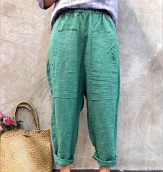 simplelinenlife-Linen-Summer-Wide-Legs-Women-Casual-Pants Comfortable Solid Color Spring Harem Pants, Comfortable Solid Color Harem Pants For Spring, Relaxed Baggy Harem Pants For Spring, Spring Casual Light Green Bottoms, Casual Green Harem Pants For Summer, Green Summer Harem Pants With Pockets, Spring Green Harem Pants With Elastic Waistband, Green Harem Pants With Elastic Waistband For Spring, Green Cotton Wide-leg Harem Pants