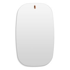 the back side of a white mouse pad with a small brown button on top of it