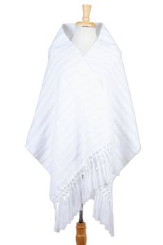 The popular Mexican song says "Cover me with your rebozo...." This rectangular shawl is so iconic the most Mexican women have at least one, and they are often taken out for Independence Day celebrations. This white cotton version is handwoven on the Maya backstrap loom by artisans of the Chiapas Highlands. They are supported by the Na Bolom Cultural Association, which has operated for decades in San Cristóbal de las Casas. The subtle stripe pattern is a result of alternating techniques and the f Cotton Shawl Poncho, Traditional White Shawl For Summer, Traditional White Summer Shawl, White Bohemian Shawl For Beach, White Bohemian Shawl For The Beach, White Shawl Scarf For Summer, White Shawl Wrap Scarf, One-size White Shawl For Summer, One Size White Wrap