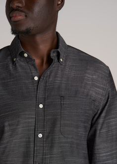 About Our Textured Weave Cotton Button-Up Shirt for Tall Men The button-up is a timeless staple when it comes to shirts for tall men. This shirt is made with all-cotton in a textured weave for added visual appeal. It’s been pre-washed and shrinkage controlled so you can do laundry without losing length. This tall men’s shirt has been designed for men from 6’ to 7’1, so it has extra-long sleeves that go all the way to your wrist. You’ll look and feel great in the modern fit and button-down collar Tall Men, Men In Black, Button Up Shirt Mens, Extra Long Sleeves, Arm Sleeve, Tall Guys, Button Down Collar, Classic Man, Modern Fit