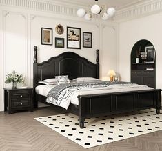 a bed room with a neatly made bed and two nightstands on either side of the bed