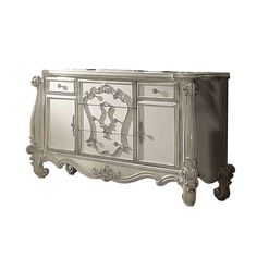 an ornate white and silver cabinet with mirrored doors on the front, sideboard or buffet