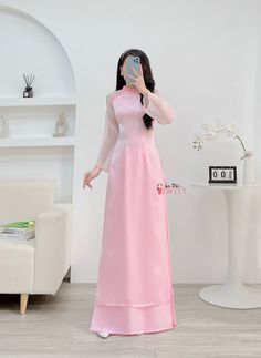 🌻Materia: Vải tơ xước Stretchy level: 0/10 This set includes: 1 ao dai top and 1 pants 🌻 The measurement of this ao dai (long dress) is in Vietnamese size (American size tends to be bigger for the same size). Please LOOK AT THE SIZE CHART CAREFULLY BEFORE ORDERING. There might have some chalk writings on the fabric due to making process. These marks can be washed away easily. 🌻🌻No returns or exchanges Buyer can contact seller about any issues with an order. 🌸 Follow us Facebook/aodaiemily www.aodaiemily.com 💜 Thank you very much!💜 Traditional Pink Ao Dai For Formal Occasions, Elegant Pink Ao Dai For Formal Occasions, Traditional Pink Cheongsam For Wedding, Pink Long Ao Dai For Wedding, Traditional Fitted Pink Ao Dai, Pink Fitted Elegant Ao Dai, Traditional Pink Ao Dai For Wedding, Pink Elegant Fitted Ao Dai, Elegant Fitted Pink Ao Dai