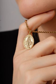 Welcome to PoshGoldJewelry, Our collection of round pendants with unique designs on top are made for both men and women. Our Virgin Mary is here! Pendant Size: 18x14mm / 0.70x0.55 inches  Pendant Thickness: 0.6mm Rope Chain Thickness: 2.10mm Material: - Sterling Silver 925 (Silver) - Sterling Silver 925 (Gold Plated) - 14K Real Solid Gold A hallmark (stamp) of the material of your pendant will be included on the back for certification. - Gift Box with each order! ✔️ You can contact us for the cr God Jewelry, Miraculous Medal Necklace, Virgin Mary Pendant, Mother Of God, Christian Necklace, Custom Pendants, Miraculous Medal, Round Pendant, Virgin Mary