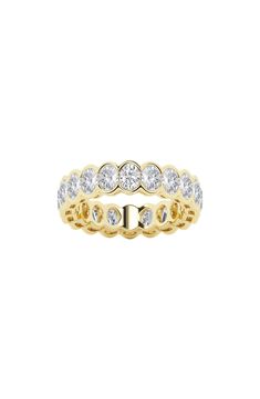 Twinkling white lab-created diamonds dust around a statement-making ring that shines in 14-karat gold or platinum. Total lab-created-diamond weight: 3ct. Color: F–G Clarity: VS2 14k gold, 14k-white gold, 14k-rose gold or platinum/lab-created diamond Imported Diamond Guide Classic Oval Diamond Eternity Band, Classic Oval Moissanite Eternity Band, Oval Diamond White Eternity Band For Formal Occasions, Elegant Oval Eternity Band With Diamond Accents, Classic Round Eternity Band With Halo Setting, Oval Moissanite Eternity Band Fine Jewelry, Oval Eternity Band With Prong Setting For Formal Occasions, Oval Cubic Zirconia Eternity Band For Anniversary, Oval Eternity Band For Anniversary In Fine Jewelry Style