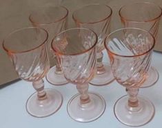 "This is a set of SIX beautiful, vintage, stemmed glasses from the popular, but now discontinued, range of Rosaline swirl from the renowned French manufacturer Luminarc / Arcoroc. These gorgeous wine glasses are petite, elegant and pretty and will inject style into any hen, bridal or princess party. Perfect for rosé and white wines. They stand 13cms/ 5\" tall. They are 5.5cms/ 2\" diameter, at the base, and 6.5cms/ 2½\" diameter at the rim. Altogether they weigh 800gms/ 14ozs. In excellent condi Victorian Antiques, White Wines, Candle Mirror, Pink Swirls, Oval Mirror, Tea Sets, Tea Cup Set, Princess Party, Shot Glasses