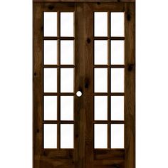 a wooden door with two glass panels