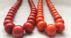 material:natural stone with heat treated coral color quantity:one strand 22inch=57-60pcs size:approx.7X10-17X22mm note:have larger stock and offert wholesale price. Orange Red Coral Necklace With Round Beads, Orange Red Coral Beaded Necklaces, Orange Red Coral Necklace With Colorful Beads, Orange Necklace With Colorful Beads And Red Coral, Red Coral Necklace With Wooden Beads, Red Wooden Beads Round Necklace, Red Necklace With Wooden Beads, Large Necklace, Jewelry Making Necklace