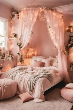 a pink bedroom with fairy lights on the ceiling and curtains over the bed in front of it