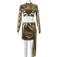 a mannequin dressed in gold metallic clothing