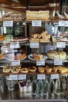 a display case filled with lots of different types of pastries