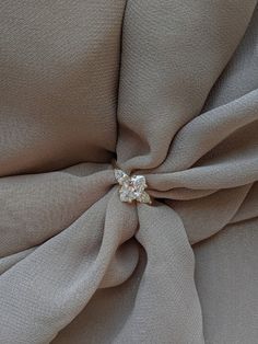 the fabric is very soft and has a diamond ring on it's center piece