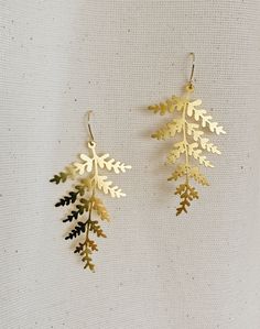 Fern Leaf Brass Earrings Length: 5,7 cm Gold plated brass hooks Nature-inspired Gold Nickel-free Earrings, Nature-inspired Nickel-free Gold Earrings, Gold Leaf-shaped Nickel-free Earrings, Gold Nature-inspired Metal Earrings, Nature-inspired Gold Earrings, Nature-inspired Gold Earrings With Ear Wire, Gold Botanical Dangle Earrings, Gold Leaf Botanical Jewelry, Gold Leaf-shaped Hoop Earrings For Gift