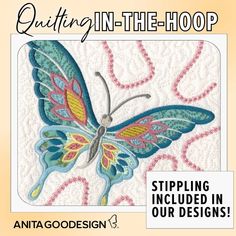 the cover of quilting in the hoop featuring a blue butterfly with pink and yellow wings