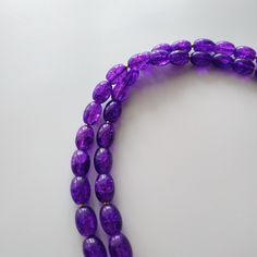 < Long glass beaded necklace with amethyst stone pendant > Very original and elegant combination. The stone is natural amethyst. Amethyst is the stone of St. Valentine and faithful love. It carries the energy of fire and passion, creativity and spirituality. This necklace can be beautiful accent to any look! > Necklace length - 89 cm (35 in) > Necklace weigth - 78 gm Purple Polished Beads Crystal Necklace As Gift, Spiritual Purple Spacer Beads, Purple Faceted Beads Crystal Necklace For Spiritual Use, Purple Amethyst Gemstone Beads, Purple Natural Stone Beads For Gift, Purple Natural Stone Beads For Gifts, Purple Amethyst Beads For Jewelry Making, Purple Glass Beaded Necklaces With Round Beads, Purple Glass Beaded Necklace With Round Beads