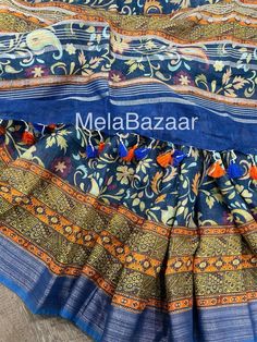 Beautiful floral print 100 count pure Linen Saree with a zari border ! Soft luxurious fabric, falls nicely and pleats easy ! Fall and tassels attached ! Blouse fabric included Color: Blue From Bihar,India Note: The color of the products may slightly vary according to the ambient lighting conditions and the color settings of LED devices. If you would like more clarity before your purchase, please drop us a message . Diwali Linen Dupatta, Traditional Blue Saree With Floral Print, Festive Linen Saree With Pallu Detail, Multicolor Cotton Saree With Floral Print, Multicolor Floral Cotton Saree, Traditional Linen Saree With Pallu, Festive Cotton Saree With Floral Print, Festive Linen Dupatta With Traditional Drape, Festive Linen Saree-shaped Dupatta