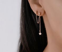 This rose gold chain earring has 2 stud earrings connected by a dangly chain. There is a star charm on the one stud. The earring is made of sterling silver 925 that is rose gold plated. This is one earring not a pair of earrings. Long Stud Earrings, Aesthetic Chain Earrings, Chain Connected Earrings, Earrings 2 Holes Double Piercing, Prom Earrings Double Piercing, Two Hole Earrings, Dangle Chain Earrings, Dangly Star Earrings, Connecting Earrings