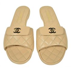 Chanel Rev Beige Turnlock Quilted Gold Cc Logo Mules Slide Sandal Flop Flat 37.5 ********** Chanel ********** Brand: Chanel Size: 37.5 (Know Your Chanel Size) Name: Mule Sandal Color: Beige Style: Rev Style#: G38232 X01000 0l490 Material: Lambskin Cc Gold Metal Turnlock Flap Front Logo Beige Lambskin Leather Quilted Material Slip On Slide Style Mule Brand New In Box, Comes With Original Box And Dust Bag 100% Authentic Or Your Money Back Great Gift I Ship Worldwide Any Other Questions Just Ask, I Luxury Synthetic Slides, Classic Cream Sandals With Leather Sole, Classic Cream Closed Toe Sandals, Classic Closed Toe Cream Sandals, Luxury Sandals With Cushioned Footbed, Luxury Synthetic Sandals With Cushioned Footbed, Beige Classic Slip-on Sandals, Classic Beige Slip-on Sandals, Designer Sandals With Textured Footbed And Round Toe