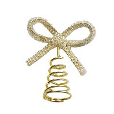 a gold and diamond bow brooch with spirals on the end, set against a white background