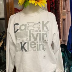 Calvin Klein White Sweatshirt Size S/P Trendy Calvin Klein Fall Tops, Trendy Calvin Klein Tops For Fall, Calvin Klein White Relaxed Fit T-shirt, Trendy Calvin Klein Top For Fall, White Crew Neck Sweatshirt For Spring, Casual White Sweatshirt For Spring, Calvin Klein Long Sleeve Logo Print Tops, Calvin Klein Long Sleeve Tops With Logo Print, Calvin Klein Logo Print Sweatshirt For Fall