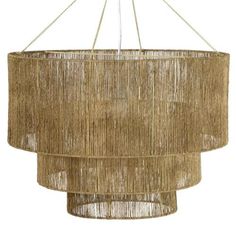 a chandelier made out of straw with three lights hanging from the top and bottom