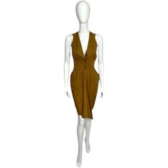 Introducing the exquisite Thierry Mugler Brown Fitted Dress, a timeless piece that embodies sophistication, elegance, and the renowned craftsmanship of the iconic fashion house. This dress is a true testament to Mugler's ability to create garments that accentuate the female form with precision and grace. Crafted with meticulous attention to detail, this fitted dress is designed to enhance your natural curves and create a flattering silhouette. The rich brown hue adds a touch of warmth and versat Fitted Brown Midi Dress, Brown Fitted Midi Dress, Chic Brown Knee-length Midi Dress, Elegant Brown Midi Dress For Cocktail, Elegant Brown Cocktail Midi Dress, Brown Formal Midi Dress For Summer, Summer Formal Brown Midi Dress, Brown Summer Midi Dress For Formal Occasions, Vintage Fitted Sleeveless Midi Dress