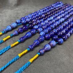 With its attention-grabbing Ottoman-style design, the 33 Beads Blue Prayer Beads combine traditional craftsmanship with modern aesthetics. This handmade Misbaha is carefully crafted from Bakelite material and carries the deep spirituality of Islamic culture. It makes an excellent gift choice for special occasions such as Eid or Ramadan. Order now for a unique spiritual gift! Product Details ✔Product Name: 33 Beads Blue Prayer Beads, Bakelite Muslim Rosary, Ottoman Style Worry Beads ✔Material: New Bakelite, ✔Bead Size: 10mm (medium) ✔Beads: 33 pieces ✔Total Length: 320 mm (Approx. 12,60 Inches) ✔Color: Blue ✔Condition : 100% Brand New You can reach all our products from the link below. https://www.etsy.com/shop/ottomantasbihshop Artisan Blue Beaded Bracelets With Round Beads, Traditional Blue Beaded Bracelets, Traditional Large Blue Beads, Traditional Hand-strung Blue Beaded Bracelets, Traditional Blue Beaded Bracelets With Large Beads, Artisan Blue Polished Beads, Traditional Blue Polished Beaded Bracelets, Traditional Blue Beaded Necklaces With 8mm Beads, Traditional Blue Beaded Necklace With 8mm Beads