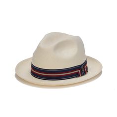 The KENDALL is a stylish, upscale hat from the Austral Panama Collection. Made with genuine Panama straw and a genuine leather band with a decorative design and gold pin, this 2.5 inch brim hat will easily become the new favorite in your closet. Elegant Fedora With Curved Brim For Travel, Elegant Curved Brim Fedora For Travel, Elegant Travel Fedora With Curved Brim, Elegant Brimmed Hats For Travel, Elegant Brimmed Travel Hats, Elegant Flat Brim Hats For Travel, Elegant Flat Brim Travel Hat, Classic White Panama Hat For Travel, Classic White Boater Hat With Curved Brim