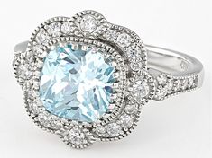 Pre-Owned Bella Luce® aquamarine and white diamond simulants 3.28ctw square cushion and round, rhodium over sterling silver ring. Measures approximately 0.81" L x 0.56" W and is not sizeable. The diamond equivalent weight is 1.98ctw..  This product may be a customer return, vendor sample, or on-air display and is not in its originally manufactured condition.  It may not be new.  In some instances, these items are repackaged by JTV. Diamond Simulant, Aquamarine, White Diamond, Cubic Zirconia, Sterling Silver Rings, Blue And White, Silver Rings, Sterling Silver, Blue