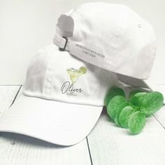 These custom margarita baseball hats are perfect for a final fiesta bachelorette, Mexico girls trip, birthday, or other boozy celebration. Personalize each hat with a name or location in modern script lettering.  Optional - add 1-2 lines of custom text to the back of each hat.  𝗣𝗘𝗥𝗦𝗢𝗡𝗔𝗟𝗜𝗭𝗔𝗧𝗜𝗢𝗡 * Add  a name or location (printed in script - up to 12 characters maximum) 𝗢𝗣𝗧𝗜𝗢𝗡𝗔𝗟: Add 1-2 lines of short custom text to each hat 3.00 per hat)  (printed in ALL CAPS - 25 characte Personalized Summer Baseball Cap With Curved Brim, White Adjustable Baseball Cap For Party, Adjustable Cap For Graduation Party, White Baseball Cap For Birthday, One Size, White Baseball Cap For Birthday, Adjustable White Mini Hats For Bachelorette Party, White Baseball Cap For Birthday, One Size Fits Most, Customizable White Hat For Birthday, White Adjustable Hat For Bachelorette Party