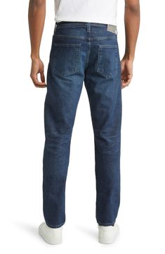 Bleach-baked jeans bring casual cool to denim days with a slim, yet comfortable fit. 14" leg opening; 10 1/4" front rise; 15" back rise Zip fly with button closure Five-pocket style 97% cotton, 3% polyester or 97% cotton, 3% polyurethane Machine wash, tumble dry Imported Casual Straight Fit Dark Wash Jeans, Casual Dark Wash Straight Fit Jeans, Dark Wash Denim Bottoms For Casual Gatherings, Straight Leg Bottoms With Five Pockets For Casual Gatherings, Mid-rise Denim Bottoms For Casual Gatherings, Medium Wash Straight Fit Tapered Leg Pants, Medium Wash Tapered Leg Straight Fit Pants, Straight Fit Tapered Leg Denim Jeans, Straight Fit Denim Bottoms With Five Pockets