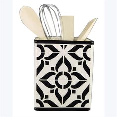 a black and white container with utensils in it