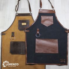 two aprons with different colors and leather straps on them, one has a ring in the pocket