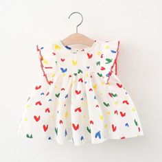 Our Be Mine Multi Heart Dress Is Perfect For Valentine's Or Any Special Occassion Such As Birthday! Cotton Sleeveless Dress For First Birthday, White Cotton Dress With Heart Print, Sweet Cotton Dress For Playtime, Cute Multicolor Dresses For Playtime, Sweet Cotton Playtime Dress, Sweet Cotton Dress For Playdate, Playful Red Dress For First Birthday, Cute Multicolor Playtime Dresses, White Sleeveless Dress With Heart Print