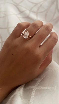 Engagement ring, pear shaped, elegant Simple Engagement Ring With Diamond Band, Different Gold Engagement Rings, Wedding Rings Raindrop, Engagement Rings Raindrop, Vintage Gold Pear Engagement Ring, Engagement Ring Astethic, Pear Shaped Engagement Rings Gold Band, Diamond Shaped Ring Engagement, Tear Wedding Rings