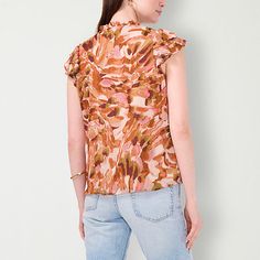 Bring a feminine touch to your casual wardrobe with this Sam And Jess women's blouse featuring an artistic abstract print in warm tones. It's crafted from lightweight chiffon for an airy feel and is cut for a regular-fit with a split tie neck and short flutter sleeves. Wear it with jeans and wedges for a chic look.Closure Type: Tie, Pullover HeadFit: Regular FitNeckline: Split Tie NeckSleeve Length: Short SleeveSleeve Style: Flutter SleeveApparel Length: 24.25 InchesFiber Content: 100% Polyeste… Casual Abstract Print Blouse For Fall, Casual Blouse With Abstract Print For Fall, Relaxed Fit Graphic Print Blouse For Fall, Fall Graphic Print Relaxed Fit Blouse, Casual Abstract Print Tops For Fall, Abstract Print Tops For Fall Workwear, Trendy Fitted Top With Abstract Print, Trendy Abstract Print Tops For Fall, Fall Workwear Tops With Abstract Print